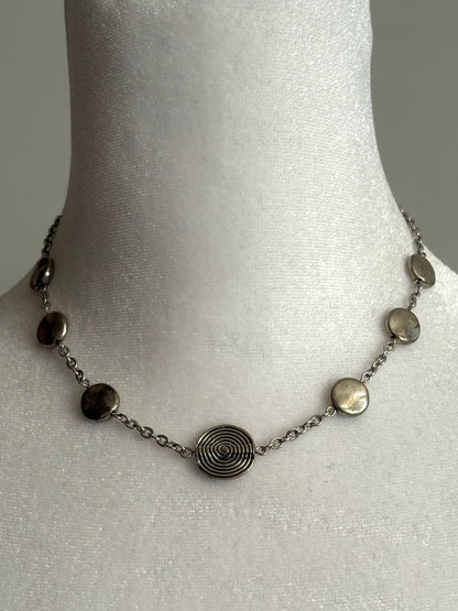 Simple Circular Beads on a Short Silver Necklace